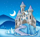 Frozen castle in winter landscape