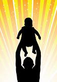 Silhouette of the father of  holding child orange