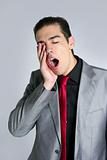 Businessman yawn boring on gray background