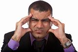 Businessman has headache because of stress