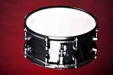 Black Snare Drum Isolated On Red