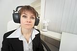 Ridiculous woman dressed on head big ear-phones