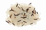 Pile of long grain brown rice on white