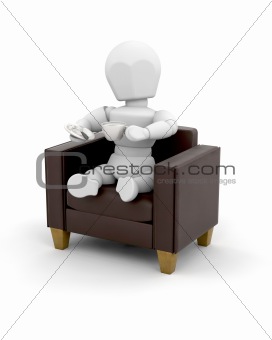 man with coffee in an armchair