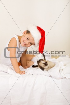 Boy with his cat waiting for christmas
