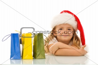 Happy little girl preparing and waiting for christmas
