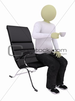 Man in armchair with cup of tea