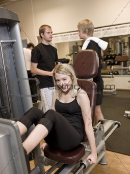 Girl using an exercise machine 