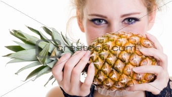 Close-up portrait of beautiful female with pineapple