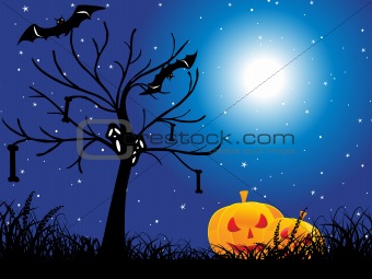 dead tree, halloween pumpkin on grass