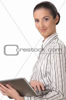 The beautiful woman holding the laptop