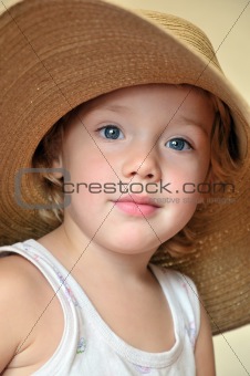 funny girl wearing huge hat