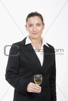 young beautiful businesswoman holding a glass of white wine
