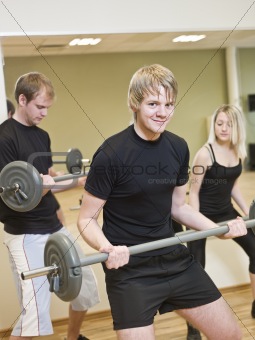 Group of people lifting weights