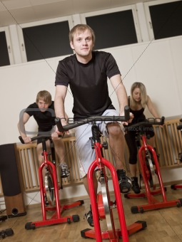Group of people having spinning class