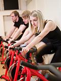 Group of people having spinning class