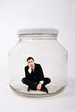 businessman in the jar