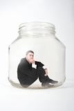 businessman in the jar