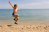 Child jump on seacoast