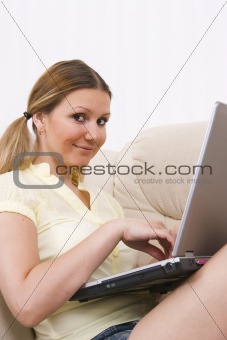 young pretty woman and laptop computer