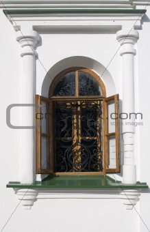 Window with decorative grille
