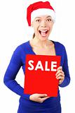 Woman with christmas sale sign 