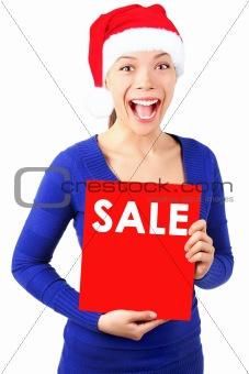 Woman with christmas sale sign 