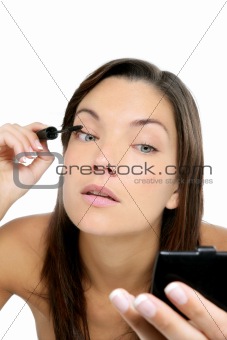 Beautiful portrait of woman makeup with brush