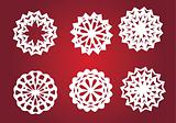 Snowflakes isolated on red background
