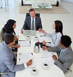 High angle of business people discussing in office a plan