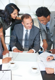 Manager and workers discussing in office a business plan