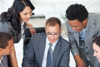 Manager working with businessteam in office