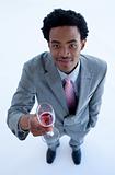 Afro-American businessman holding a glass of wine
