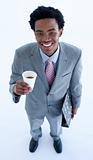 Ethnic businessman dirinking coffee 