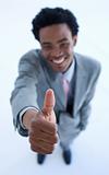 Successful businessman with thumb up