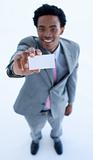 African businessman showing a small business card