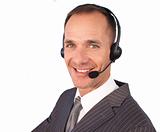 Businessman with a headset on talking to somebody
