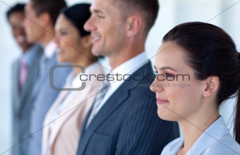 Beautiful businesswoman with her team in a line