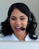 Ethnic businesswoman in a call center
