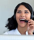 Beautiful businesswoman talking in a call center