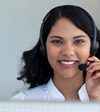 Portrait of a businesswoman talking in a call center