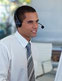 Hispanic businessman working in a call center