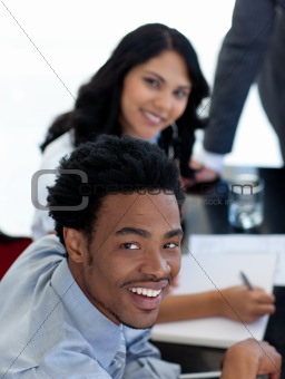 Smiling Afro-American businessman in a meeting