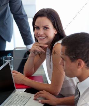 Businesswoman in office with colleagues
