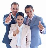 Smiling business team with thumbs up