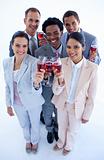 High angle of multi-ethnic business team drinking wine