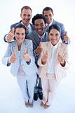 Happy multi-ethnic business team with thumbs up