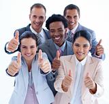 High angle of multi-ethnic business team with thumbs up