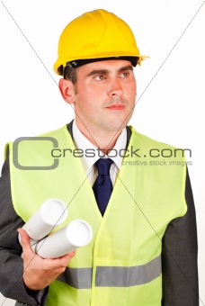Male architect holding plans and wearing a hard hat