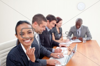 Smiling Indian businesswoman in a meeting